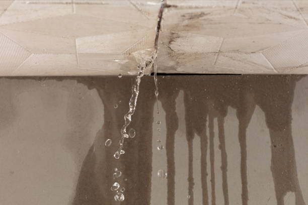 Professional Flood Damage Cleanup technician working in Kensington, NY